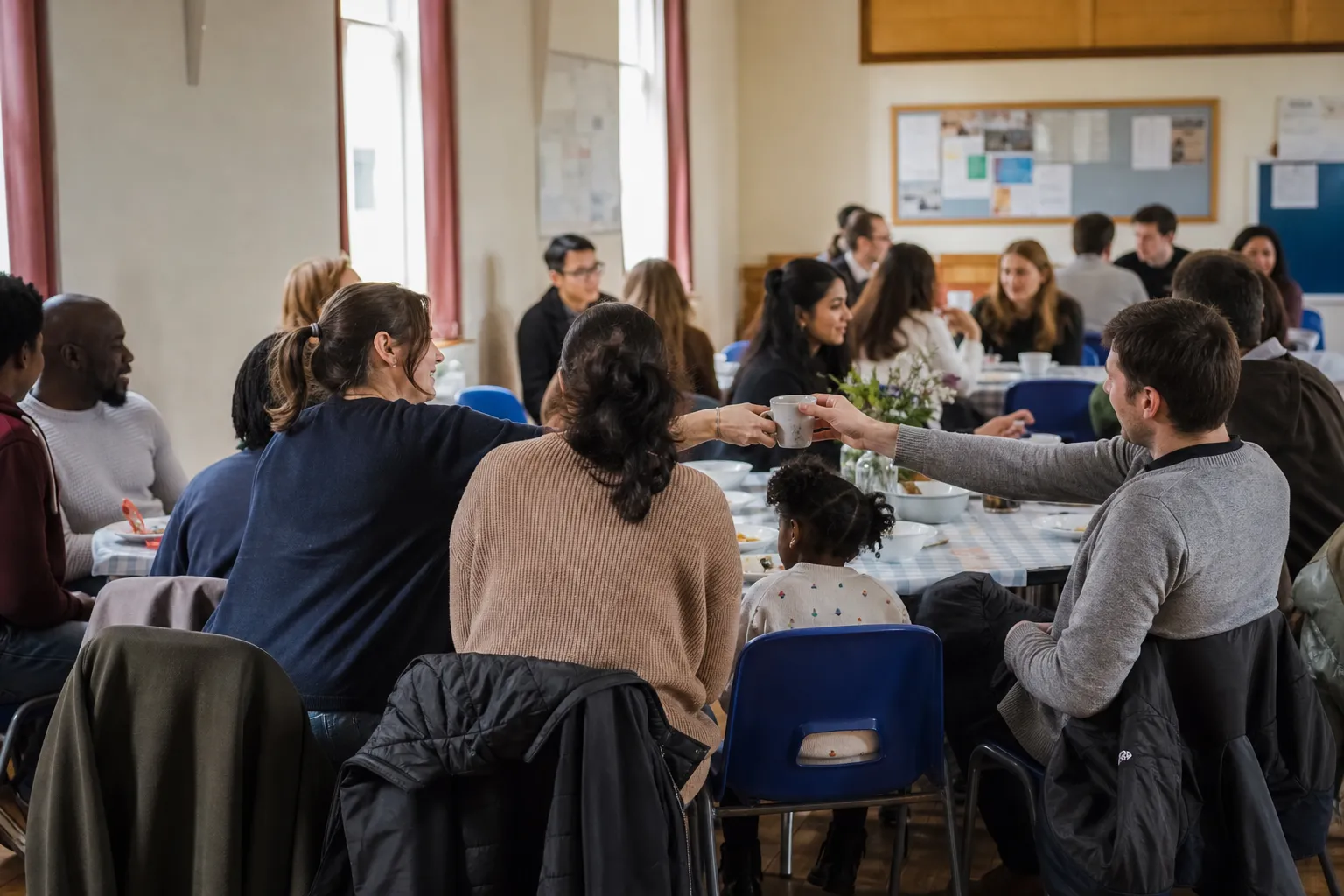 A young, diverse community sharing tea and connecting together